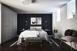 Dark gray walls in the bedroom interior