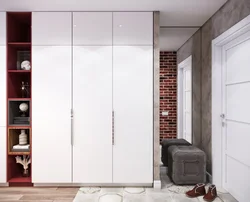 Sliding wardrobe in the hallway design white