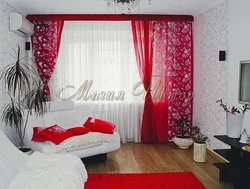 Living room with red curtains photo