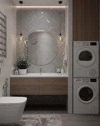 Gray washing machine in the bathroom interior