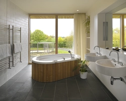 Bathroom design with a window in a country house