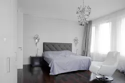 Bedroom with gray floor photo