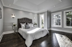 Bedroom with gray floor photo