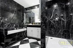 Black floor in the bathroom interior photo