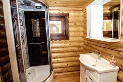 Bathroom in a log house photo