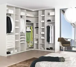 Spacious wardrobe in the bedroom with photo