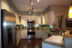 Lamps in a small kitchen interior photo