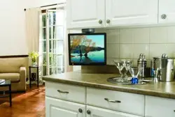 Photo of TV in the kitchen on the table