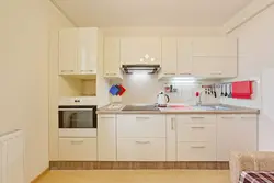 Beige household appliances in the kitchen interior