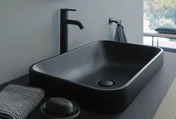 Black sink in the bathroom interior