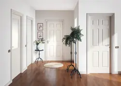 White doors and baseboards in the apartment photo