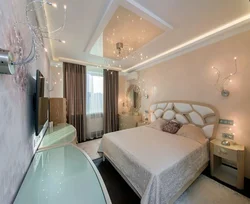 Stretch ceiling design in a bedroom 12 square meters