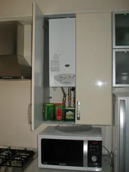 Close the gas water heater in the kitchen photo