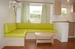 Sleeping sofa in the kitchen interior photo