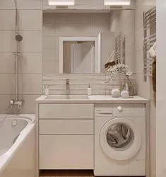 Interior Of A Bathroom With A Bathtub Without A Toilet With A Washing Machine