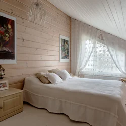 Interior Of A Bright Bedroom In A Wooden House