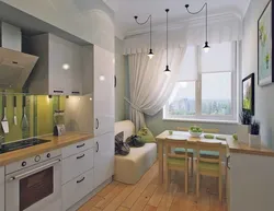 Rectangular kitchen design with sofa and balcony