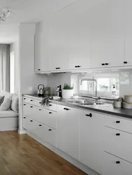 White Kitchen Design With Black Handles