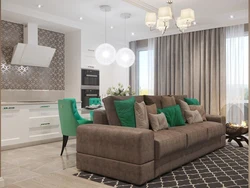 Green sofa in the interior of the kitchen living room