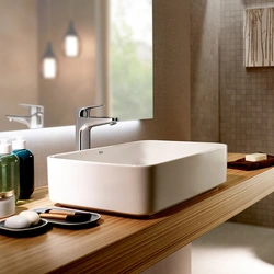 Bathtub design with countertop sink photo