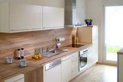 Kitchen with wooden countertop and wood-effect apron design photo