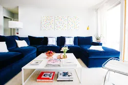 Blue sofa in the bedroom interior