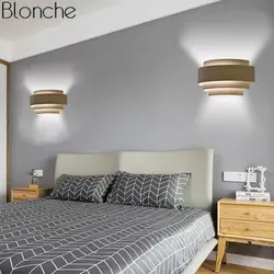 One lamp above the bed in the bedroom photo