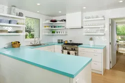 Kitchen with turquoise countertop photo