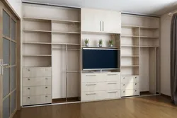 Wall-to-wall wardrobe in the living room design