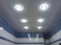 Light bulbs in the suspended ceiling in the bathroom photo