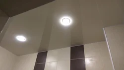 Light bulbs in the suspended ceiling in the bathroom photo