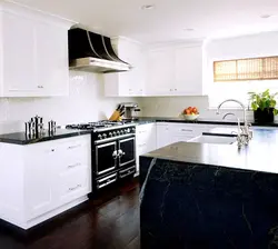 Kitchen with black countertop interior design