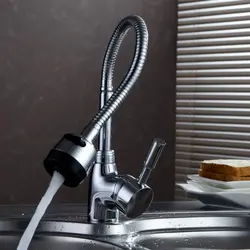 Фото крана с водой на кухне