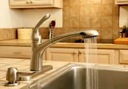 Photo of a water tap in the kitchen