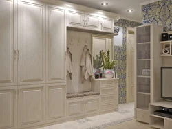 Photo of the interior of the hallway with a wardrobe in light colors