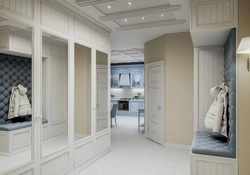 Photo of the interior of the hallway with a wardrobe in light colors