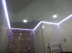 Illuminated ceiling in the bathroom photo in