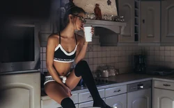 In underwear in the kitchen photo