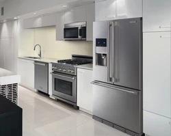 Silver Refrigerator In The Kitchen Interior