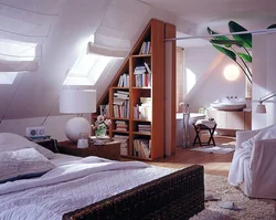 Attic design with a gable roof bedroom photo