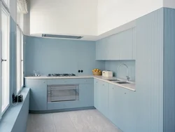 Gray blue kitchen with white photo