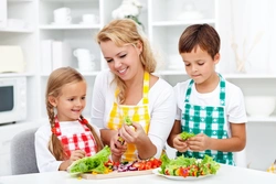 Photo of mom at home in the kitchen