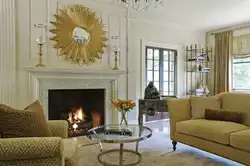 Mirror above the fireplace in the living room interior photo