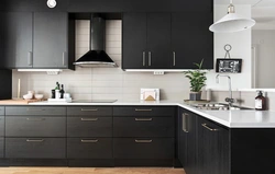 Dark gray kitchen with white photo