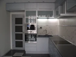 Kitchen design with pencil case and refrigerator photo