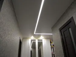 Light lines on the ceiling in the hallway photo