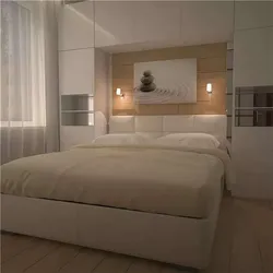 Bedroom design with wardrobes on the sides