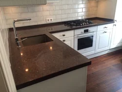 Countertop made of artificial stone in the kitchen interior