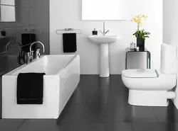 Bath design with black and white floor