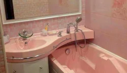 Bathroom with one faucet for bathtub and sink photo